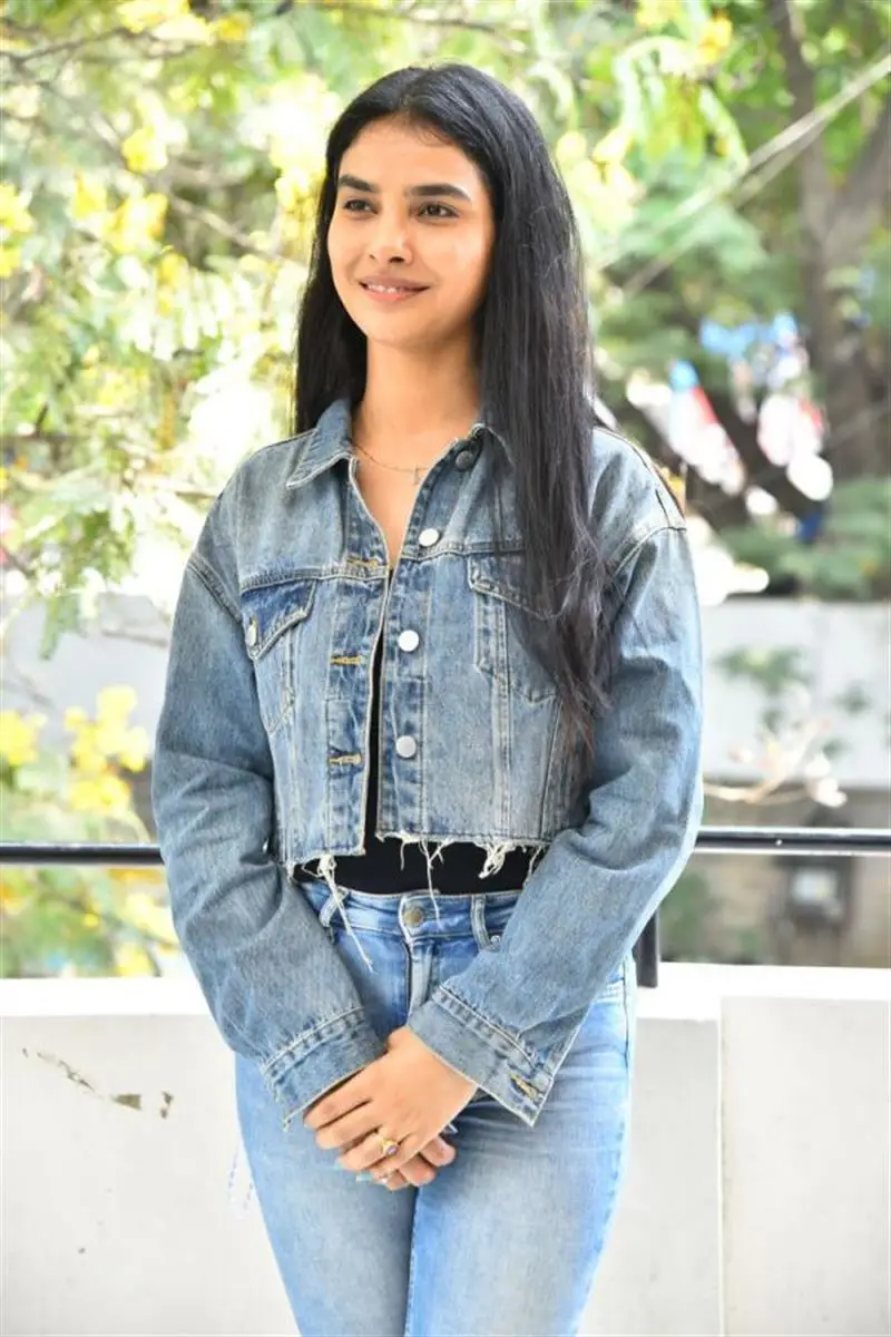 Meenakshi Goswami in Blue Shirt Jeans Pant